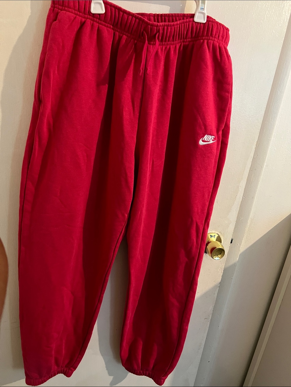 Nike  women 
Red Fleece Joggers with White Swoosh